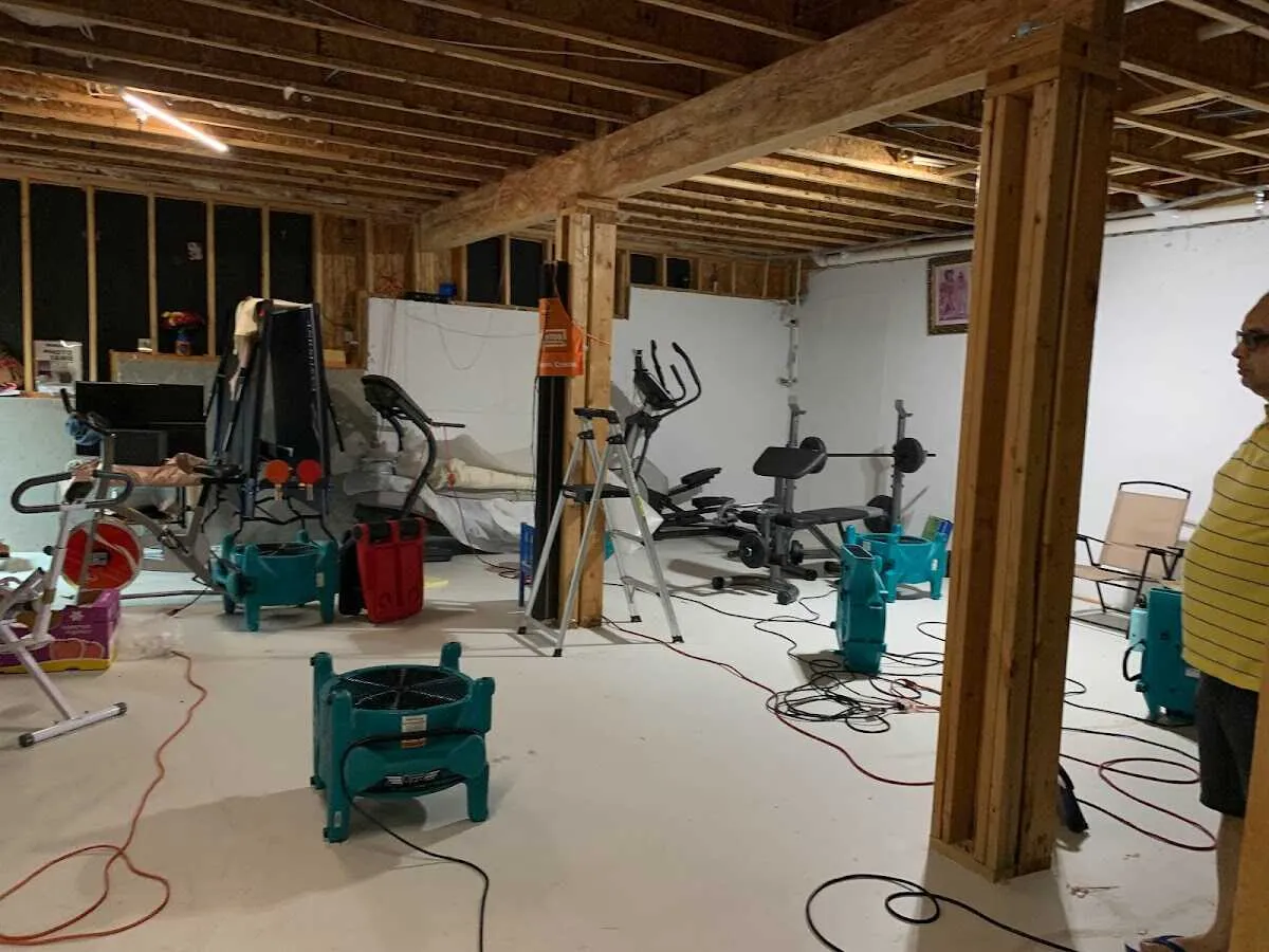 Basement drying equipment setup for Contents Cleaning & Restoration in Lansing