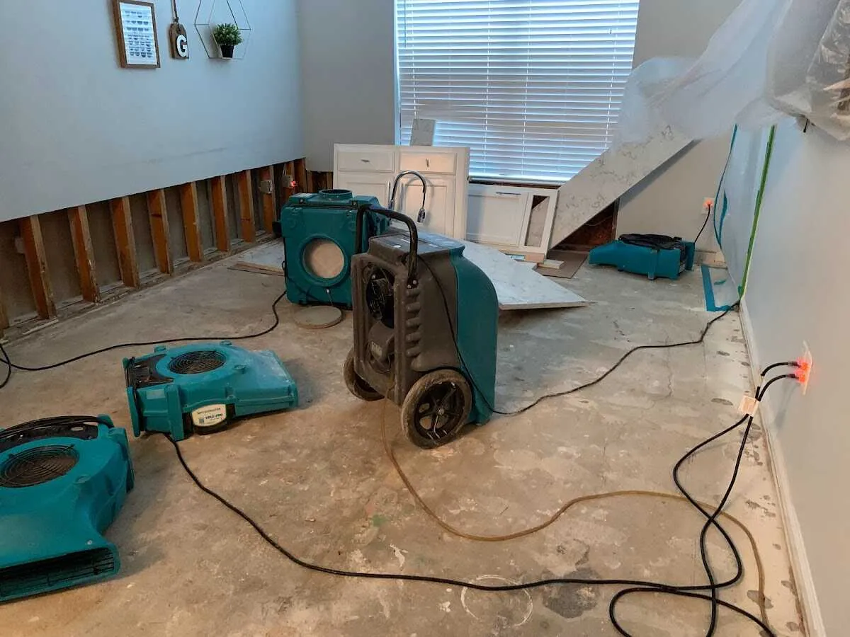 Dehumidifier in flood-cut room for Water Extraction & Removal in Lansing